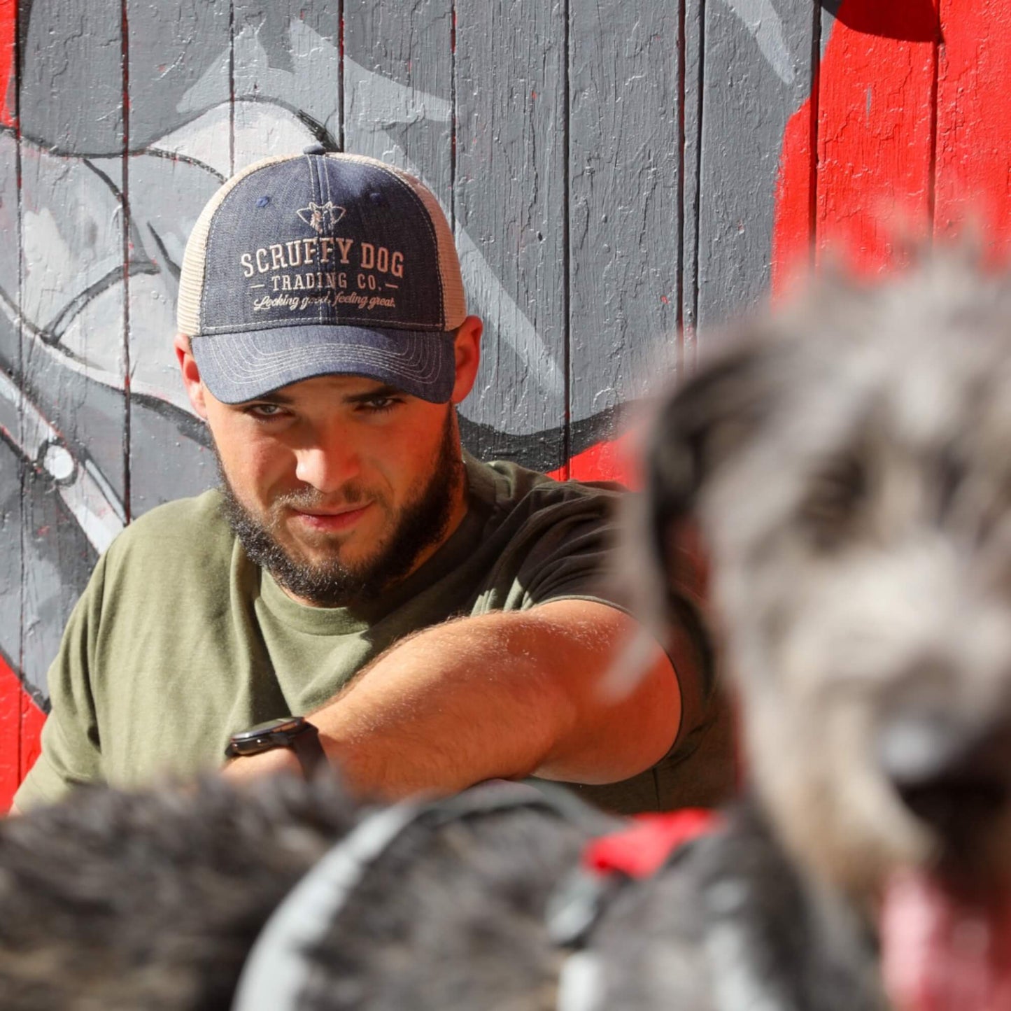 Unisex vintage denim trucker hat worn outdoors by Scruffy Dog